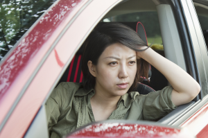 Tired_woman_in_car_300_199_int_c1-1x.png